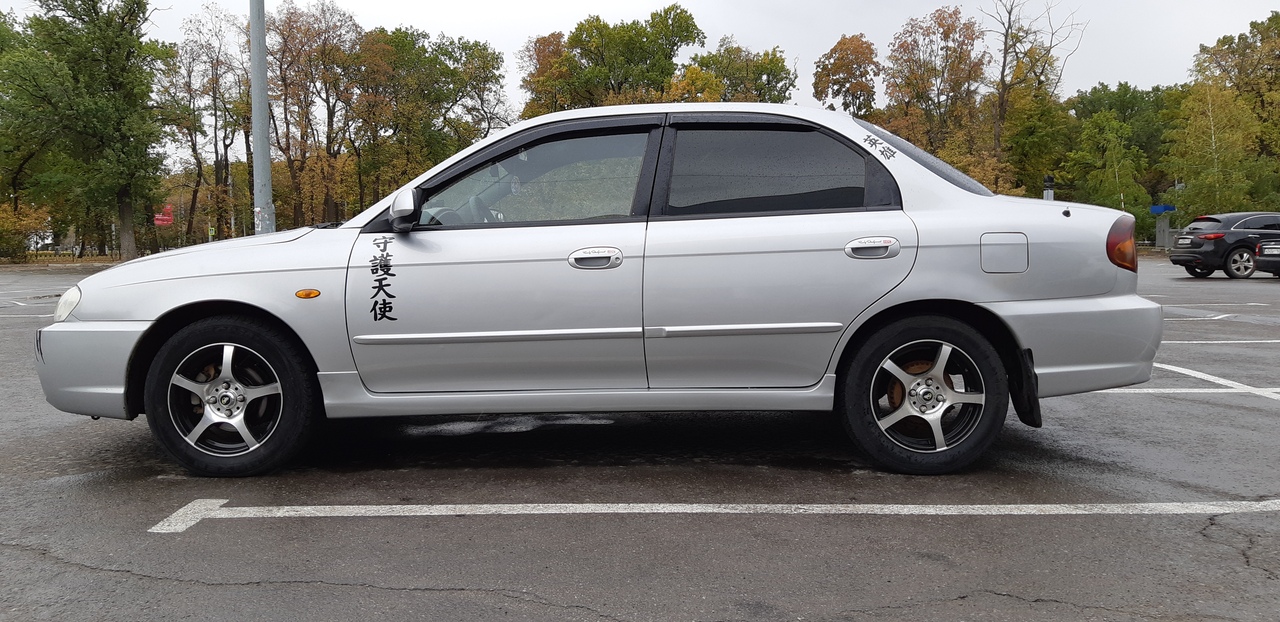 Пороги для автомобиля Kia Spectra "Fanat" (2 шт) (некрашеные)